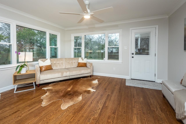 sunroom featuring ceiling fan