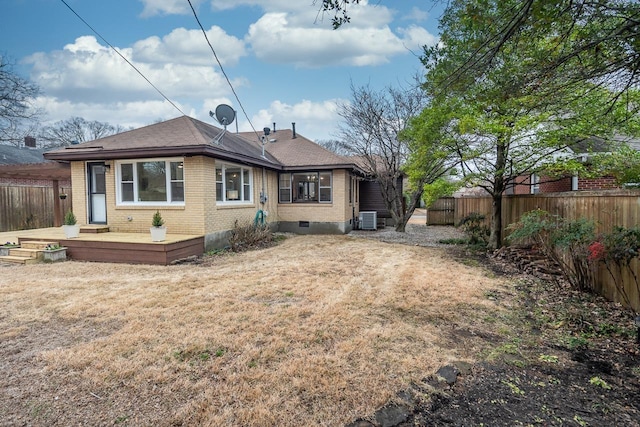 back of house featuring crawl space, fence private yard, cooling unit, a wooden deck, and brick siding