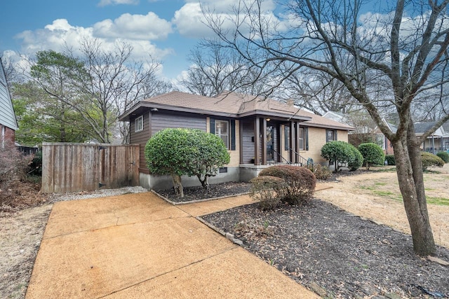 bungalow featuring crawl space and fence