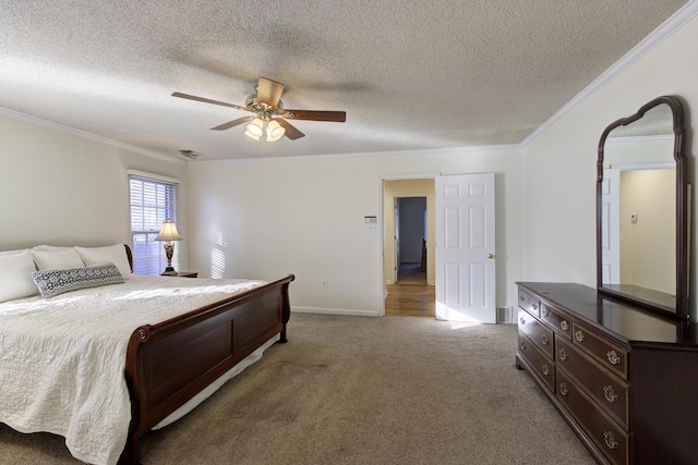 carpeted bedroom with baseboards, a textured ceiling, ornamental molding, and a ceiling fan