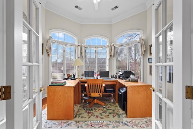 office with ornamental molding, french doors, and visible vents