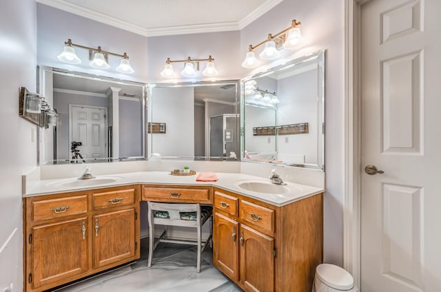 full bathroom featuring ornamental molding, a sink, and double vanity