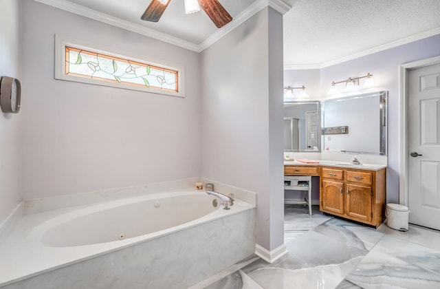 full bathroom with ceiling fan, a textured ceiling, vanity, ornamental molding, and a whirlpool tub