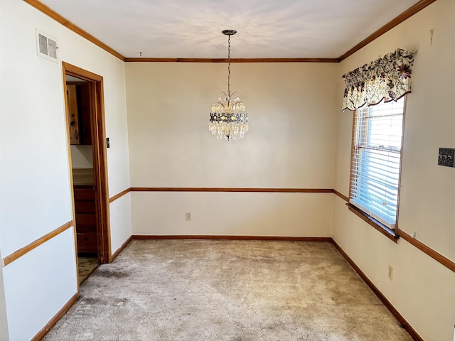 spare room featuring ornamental molding, a chandelier, light carpet, and baseboards