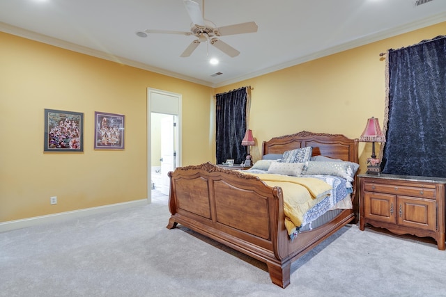 carpeted bedroom featuring baseboards, visible vents, and ornamental molding