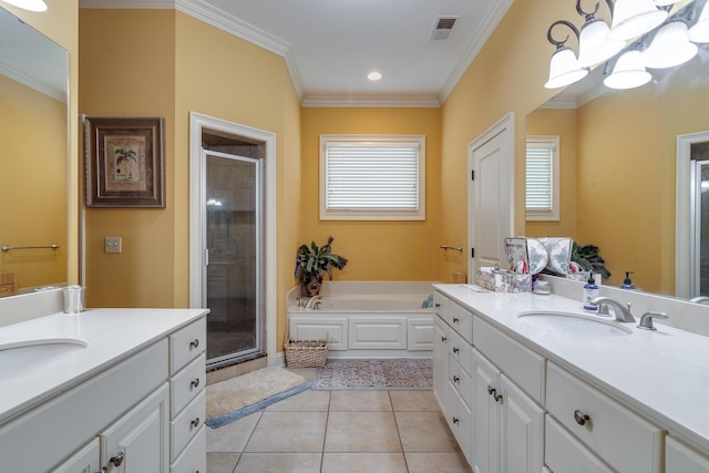 full bathroom with visible vents, ornamental molding, a sink, a shower stall, and tile patterned flooring