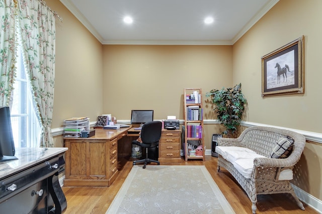 office space with light wood finished floors, crown molding, and recessed lighting