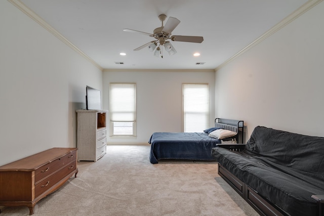 bedroom featuring light carpet, crown molding, visible vents, and ceiling fan