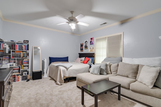 bedroom featuring visible vents, crown molding, carpet flooring, and ceiling fan