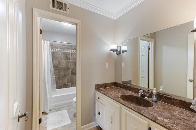 bathroom featuring visible vents, toilet, ornamental molding, a textured ceiling, and vanity