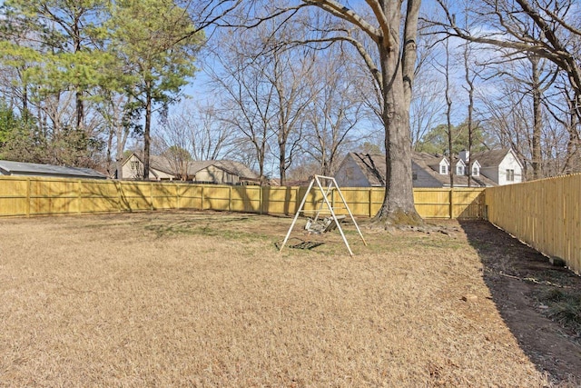 view of yard with a fenced backyard