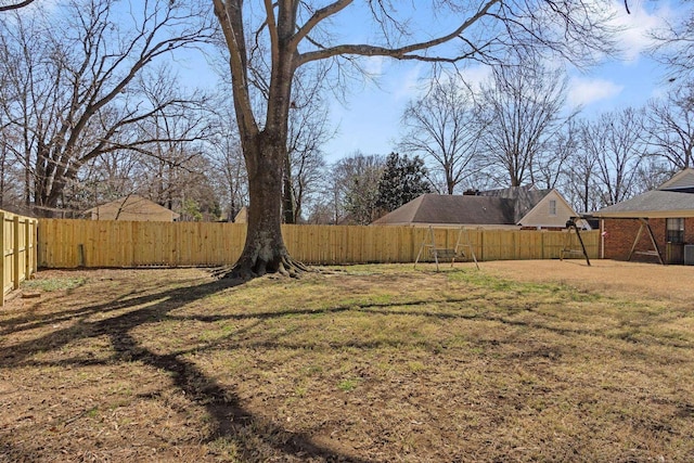 view of yard with a fenced backyard