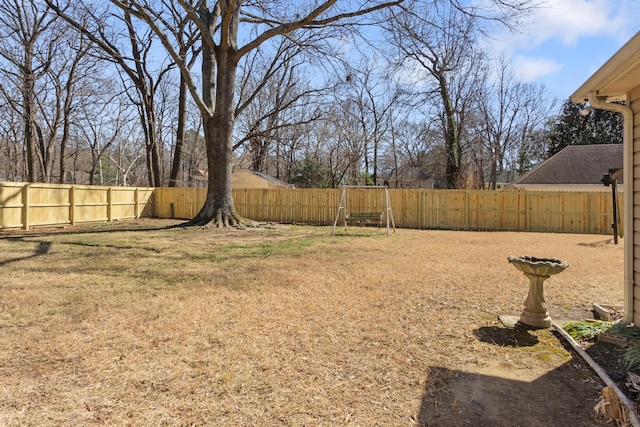 view of yard featuring a fenced backyard