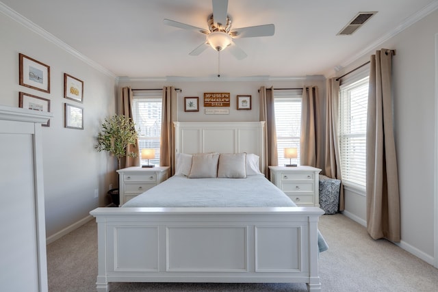 bedroom featuring ornamental molding, light colored carpet, visible vents, and baseboards