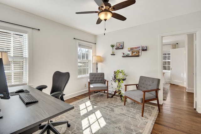 office with ceiling fan, baseboards, and wood finished floors