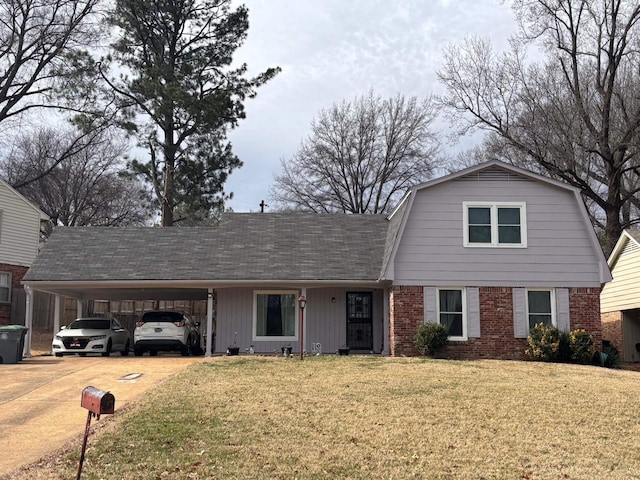 view of front of house with brick siding, concrete driveway, a gambrel roof, an attached carport, and a front lawn