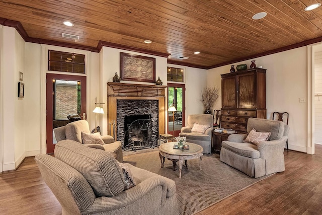 living area with wooden ceiling, ornamental molding, and wood finished floors