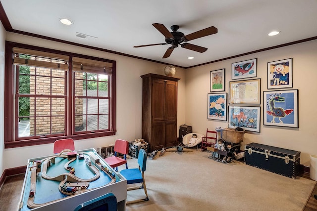 game room featuring ornamental molding, carpet flooring, visible vents, and recessed lighting