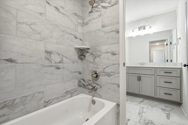 full bath with marble finish floor, shower / tub combination, and vanity