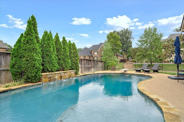 view of pool featuring a patio, a fenced backyard, and a fenced in pool