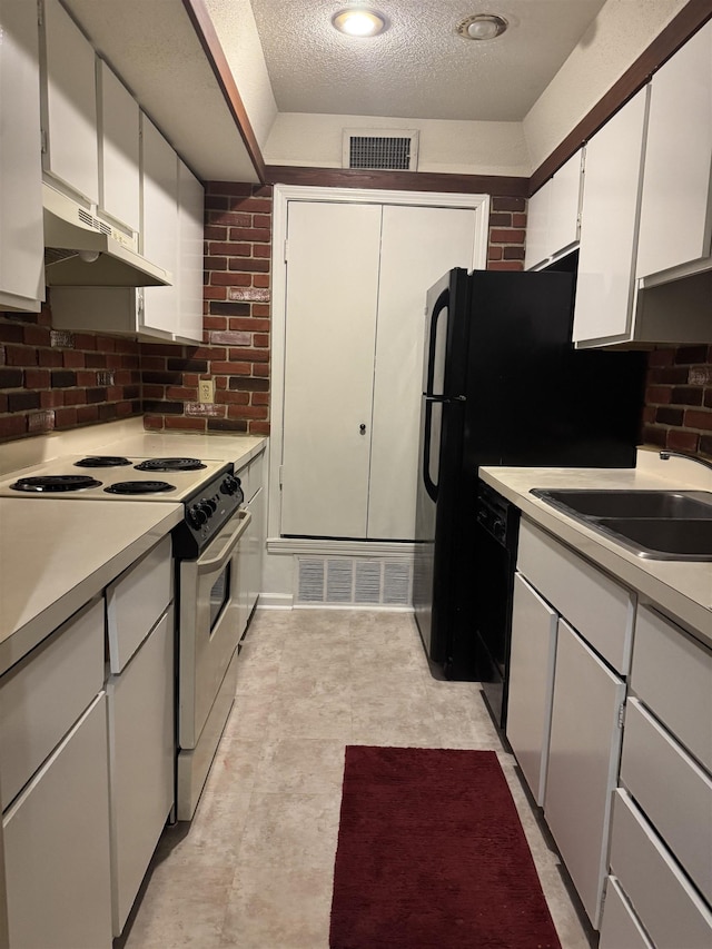 kitchen featuring visible vents, range with electric cooktop, dishwasher, light countertops, and under cabinet range hood