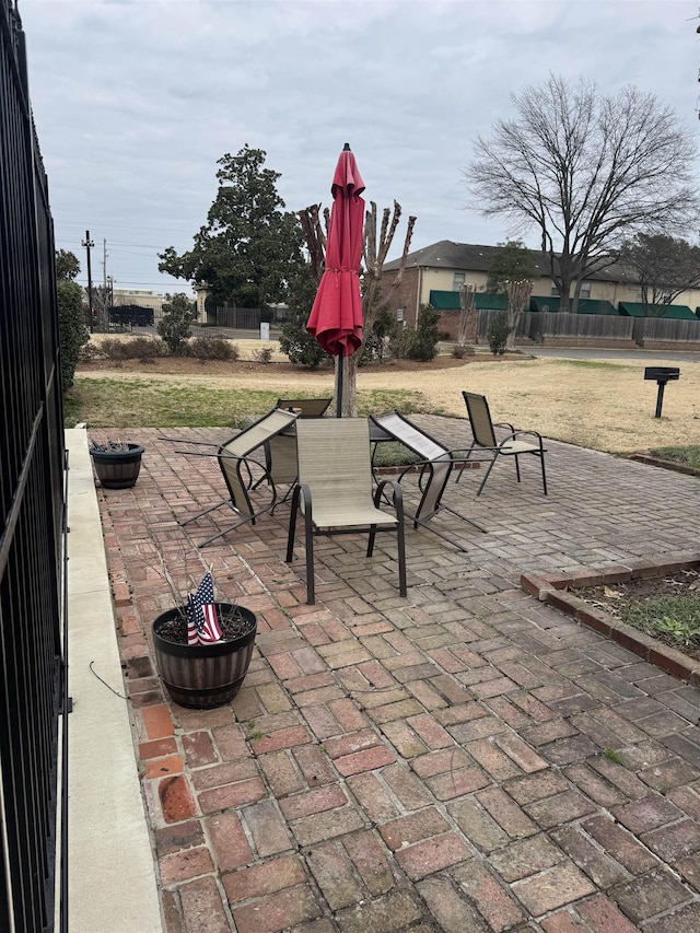 view of patio with fence