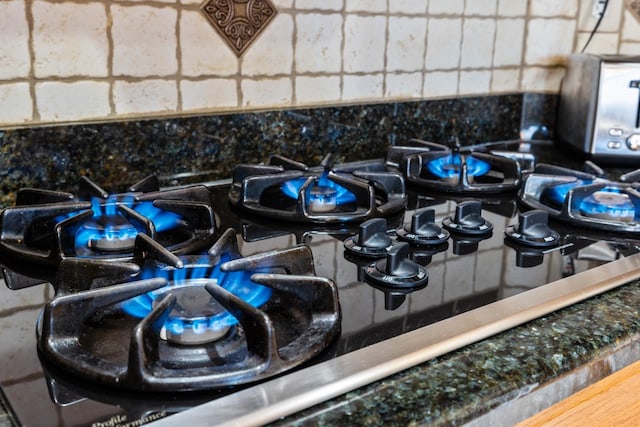 interior details with black gas stovetop