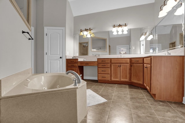 full bathroom with a whirlpool tub, double vanity, a sink, and tile patterned floors