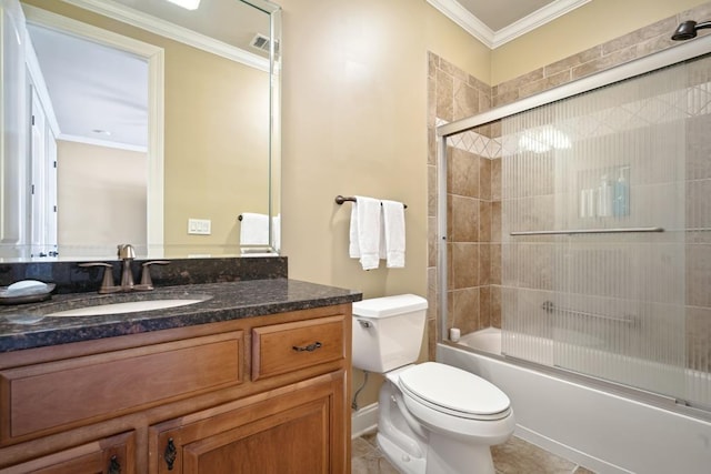 bathroom featuring toilet, shower / bath combination with glass door, crown molding, and vanity