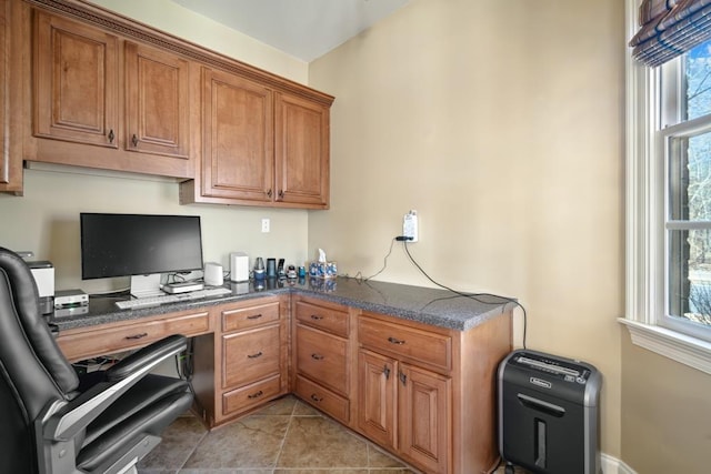 home office featuring light tile patterned floors