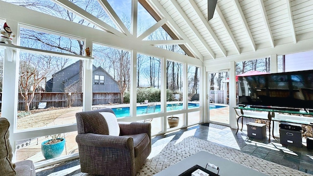 sunroom featuring vaulted ceiling with beams and wooden ceiling