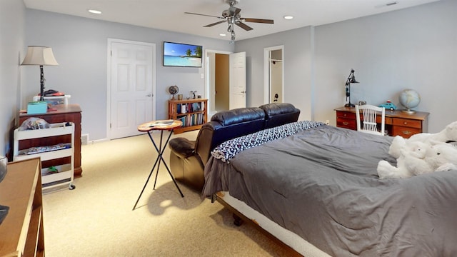 bedroom with recessed lighting and light colored carpet