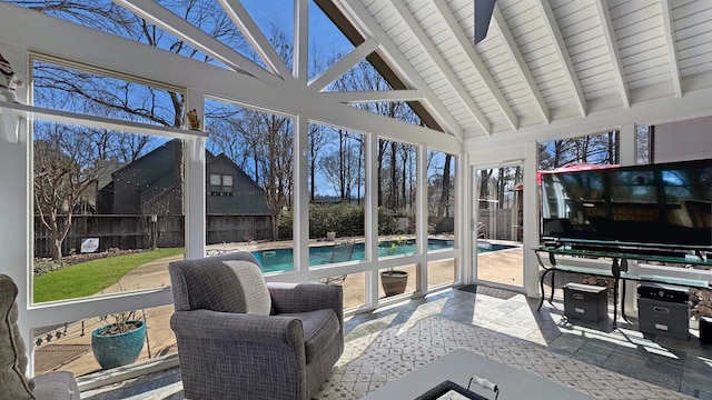 sunroom featuring wooden ceiling and lofted ceiling with beams