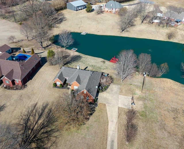 drone / aerial view featuring a water view