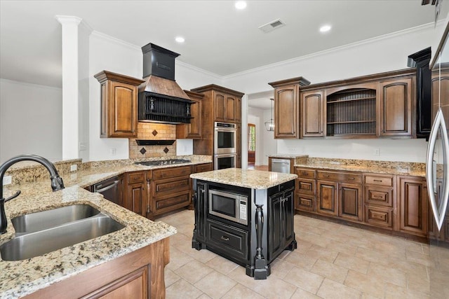 kitchen featuring tasteful backsplash, crown molding, stainless steel appliances, and a sink