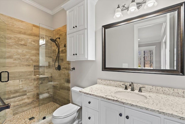 full bath featuring toilet, a stall shower, and ornamental molding