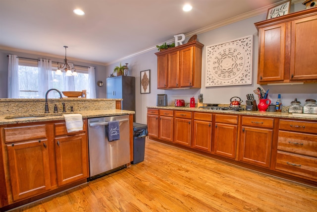 kitchen with dishwasher, light wood-style flooring, ornamental molding, brown cabinets, and a sink