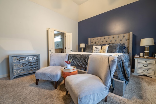 carpeted bedroom featuring baseboards