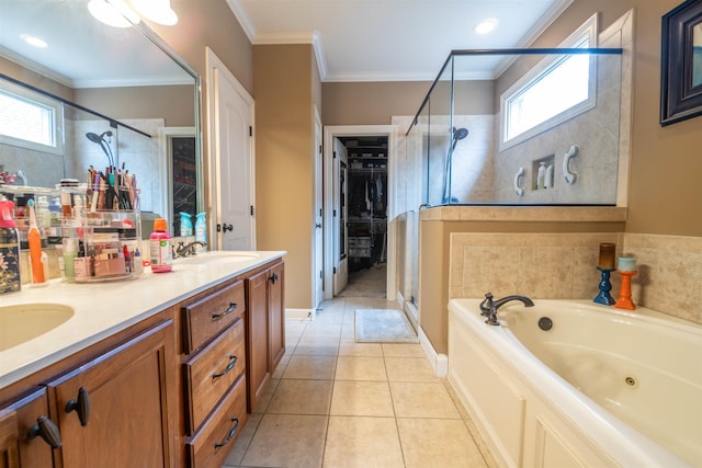 bathroom featuring a sink, a jetted tub, a shower stall, tile patterned floors, and crown molding