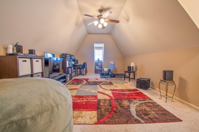 bedroom with carpet, baseboards, and vaulted ceiling