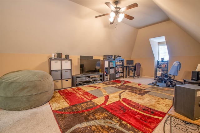 interior space featuring lofted ceiling, carpet floors, and ceiling fan