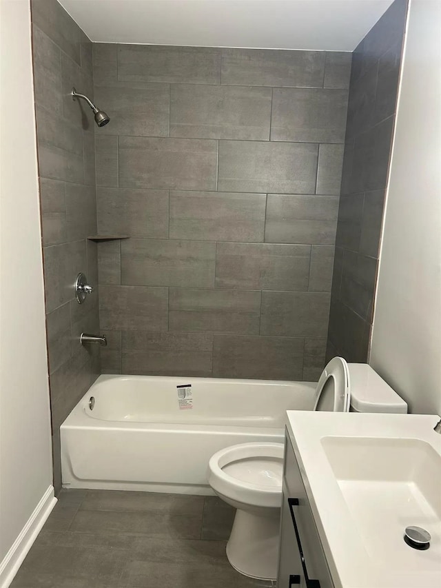 full bathroom with toilet, shower / tub combination, tile patterned flooring, and vanity