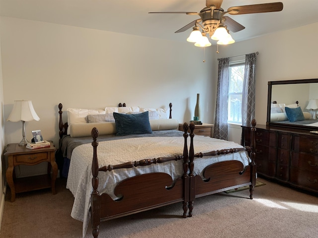 carpeted bedroom featuring a ceiling fan