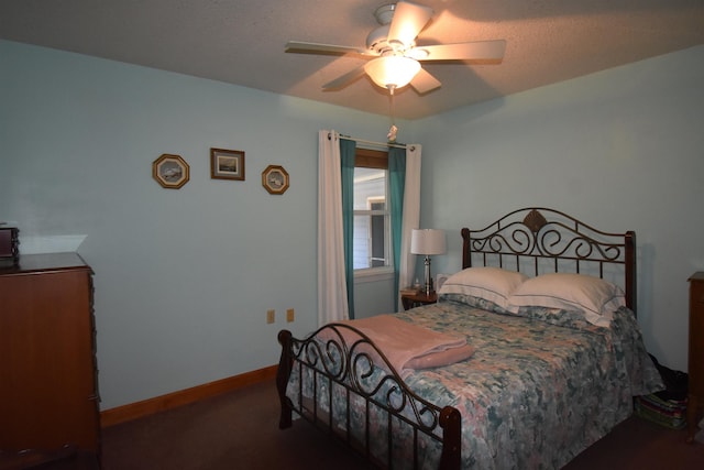 bedroom featuring carpet, baseboards, and a ceiling fan