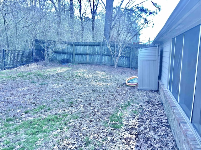 view of yard featuring a fenced backyard