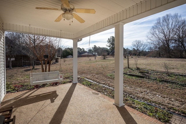 view of patio featuring ceiling fan