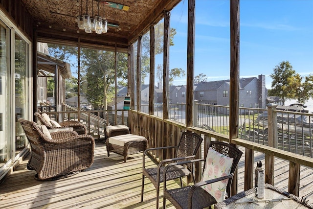 sunroom with a residential view