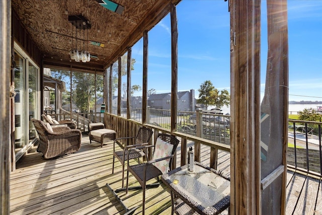 unfurnished sunroom featuring a healthy amount of sunlight