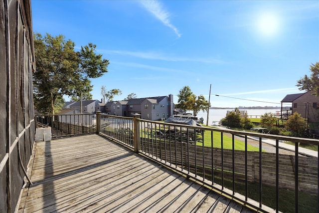 wooden deck featuring a residential view