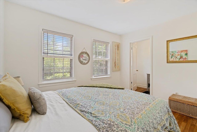 bedroom featuring wood finished floors